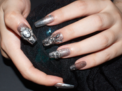 black with nude nails, playboy bunny nail charms, cross nail charms, long press on coffin nails, monoschic