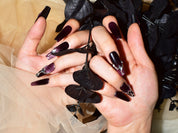 monoschic black purple glitter glitter long cat eye french tip nails