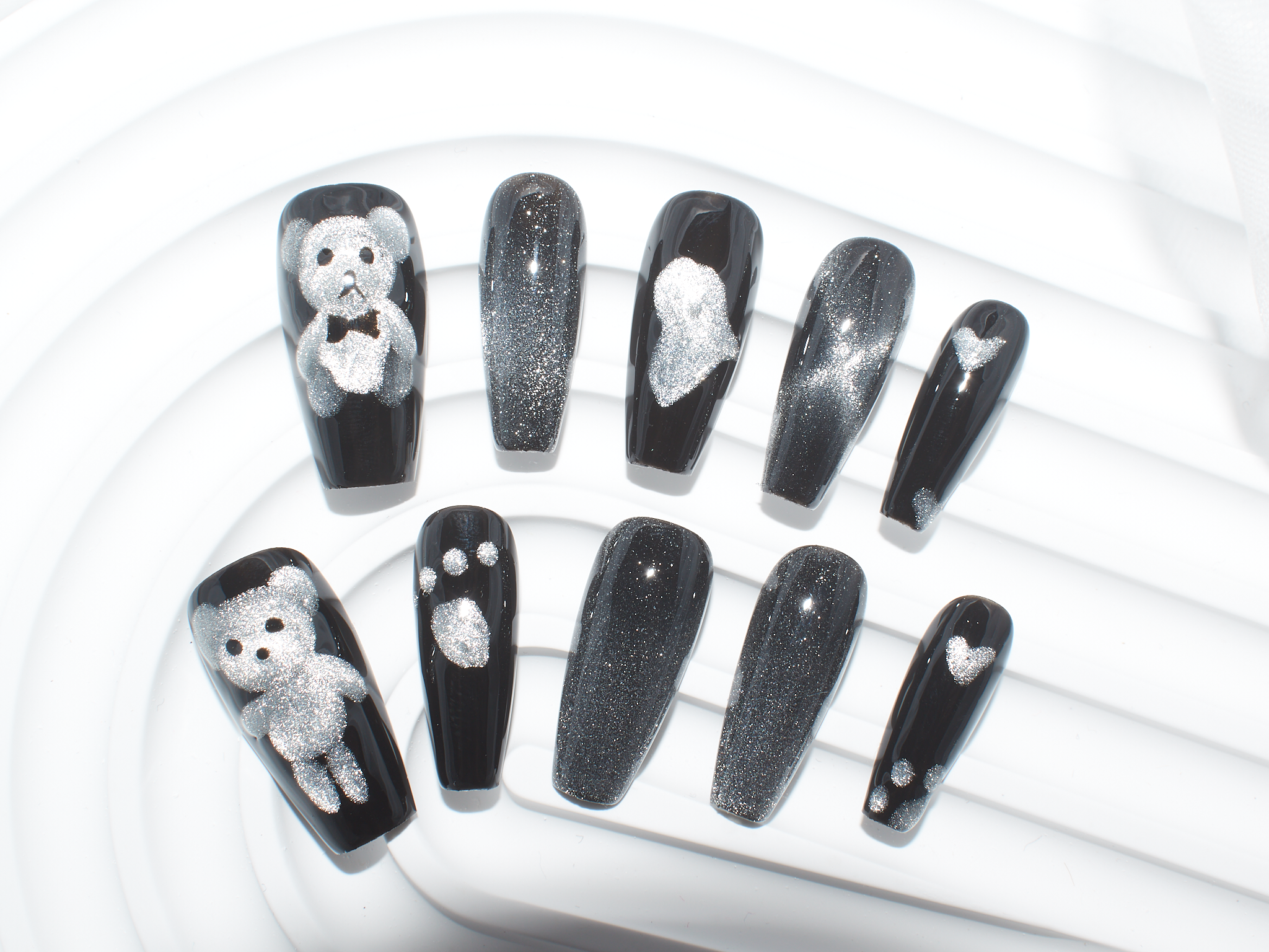 cat eye press on nails, black glitter nails, white teddy bear, coffin nail tips, monoschic nails