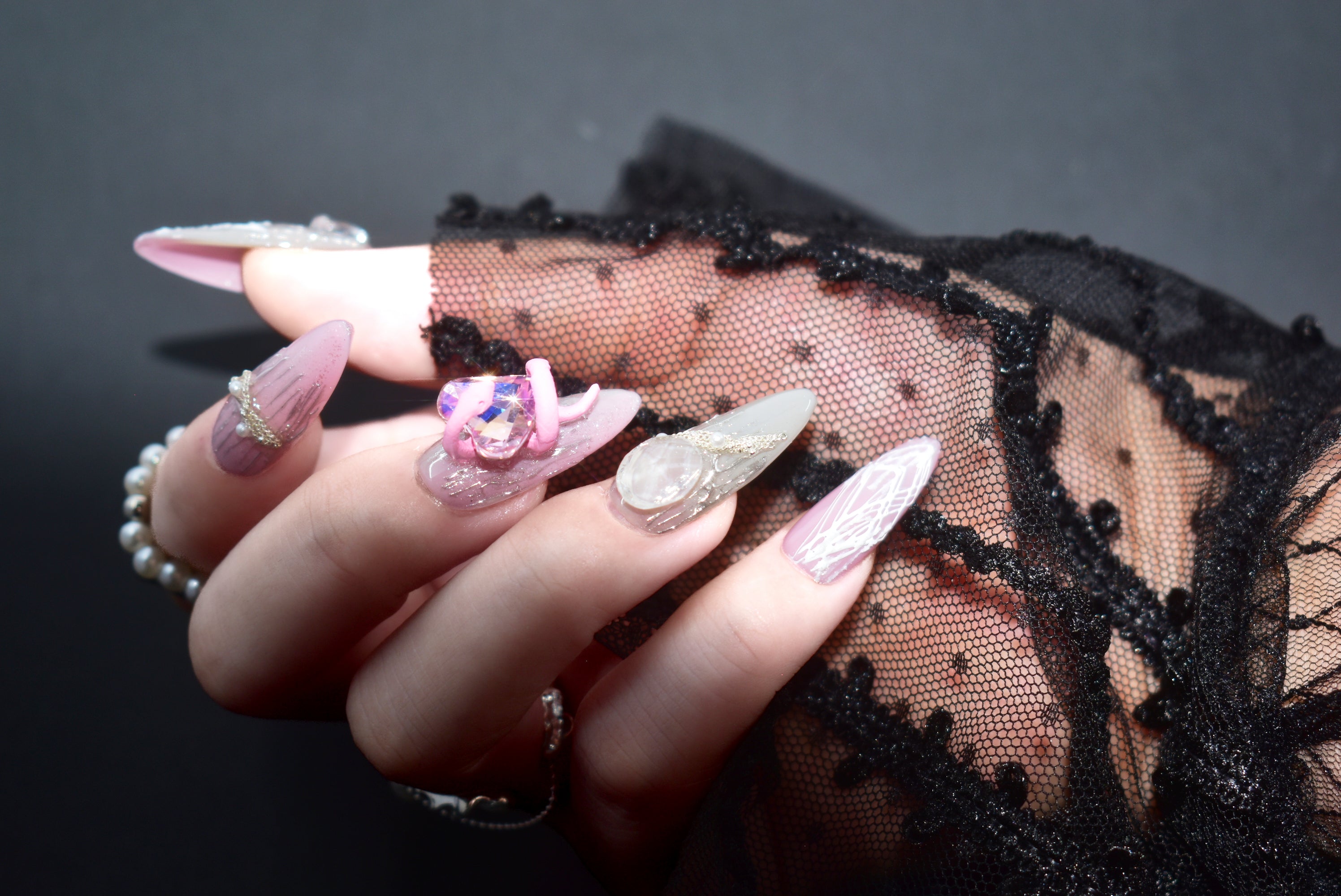 pink press on nails | long, snake acrylic nails, hear rhinestone nails, new noble nails, monoschic nails